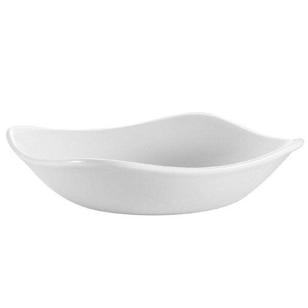 A CAC white porcelain bowl with a curved edge.