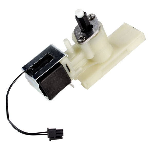 A close-up of a white plastic Cornelius water valve assembly with a black wire.