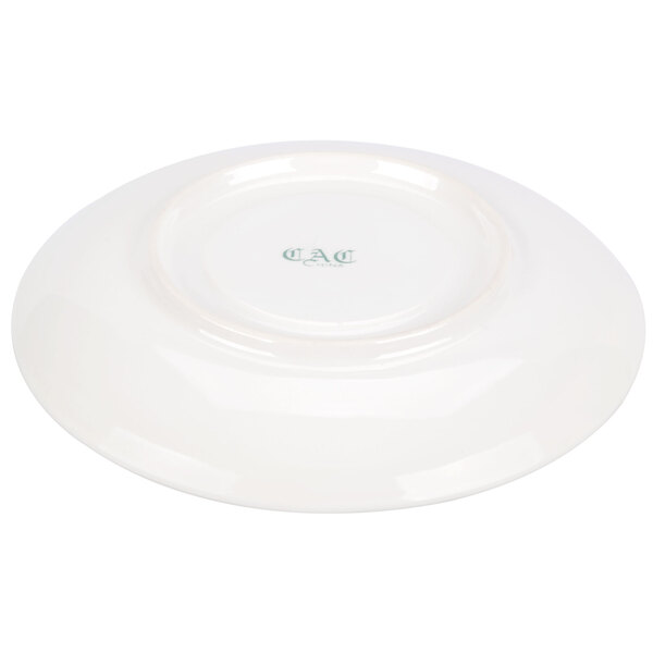 A white plate with green writing on it.