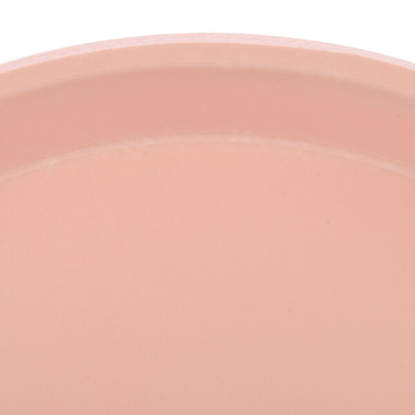 A close up of a pink tray.