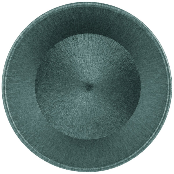 A teal polyethylene round basket with a circular pattern.