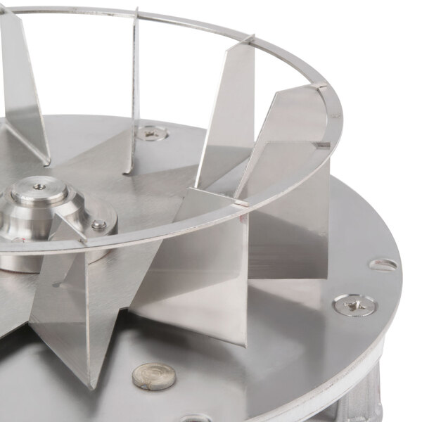 A TurboChef blower motor assembly with a metal circular blade.