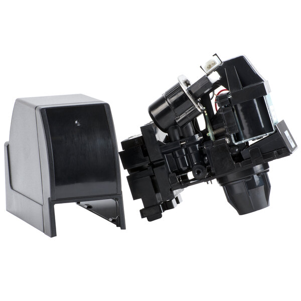 A black Cornelius soda push button valve.