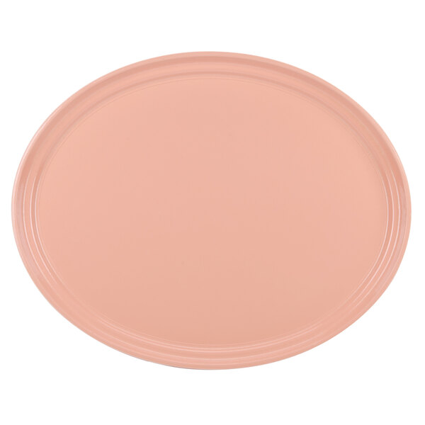 A dark peach oval Cambro tray.