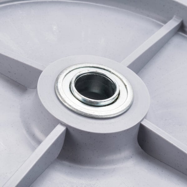 A gray Cambro replacement wheel with a metal nut.