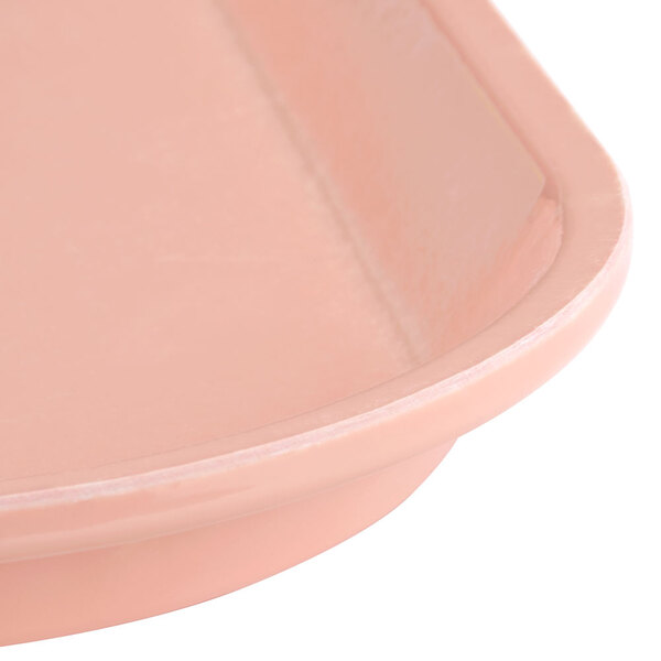 A dark peach square Cambro tray with a customizable black surface.