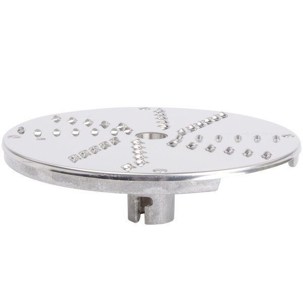 A Robot Coupe stainless steel grating/shredding disc with holes.
