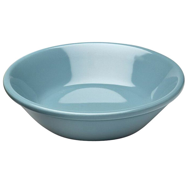 A blue melamine monkey dish with a white background.