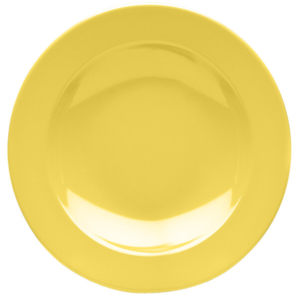 A white melamine pasta bowl with yellow olive oil.