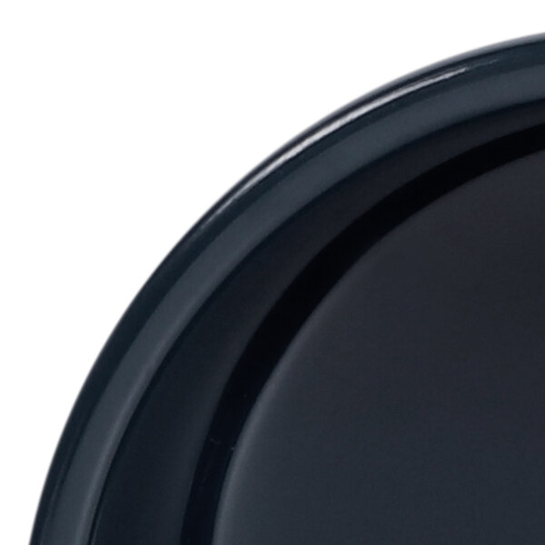 An Elite Global Solutions Lapis blue melamine ramekin on a black plate.