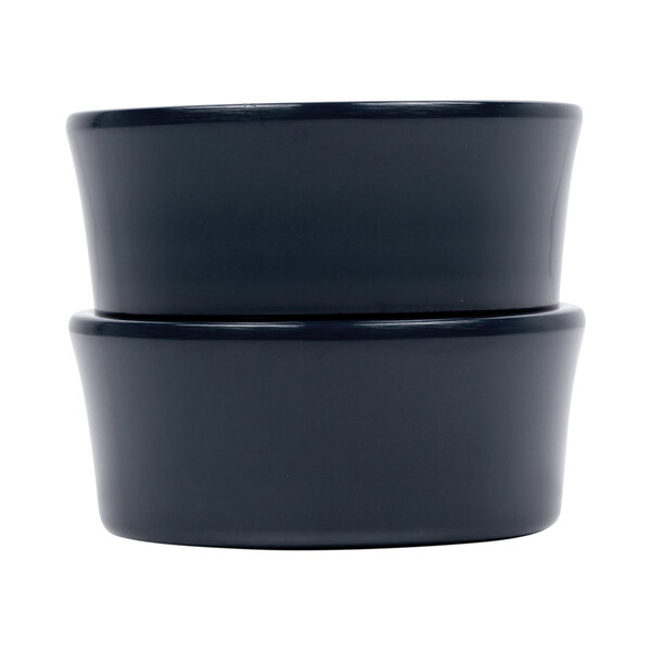 A black Elite Global Solutions Lapis melamine ramekin with a white background.
