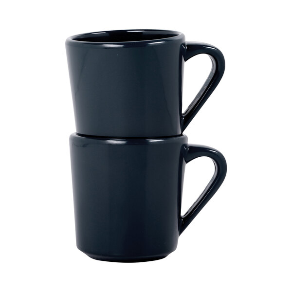 A stack of six black Elite Global Solutions melamine mugs.