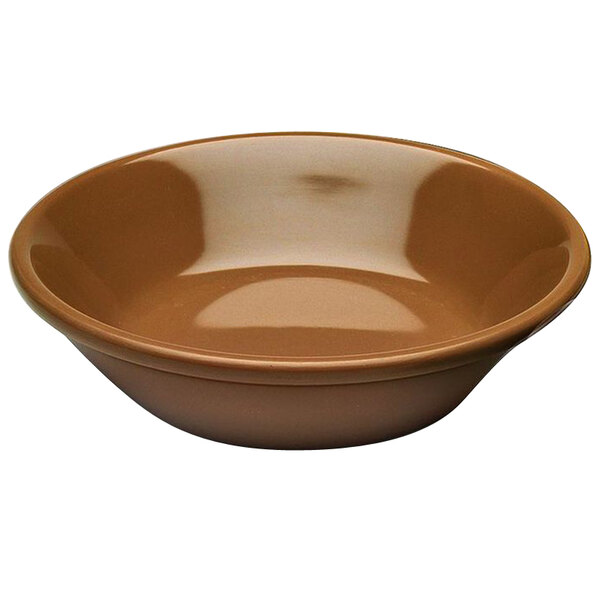 An Elite Global Solutions brown melamine monkey dish.