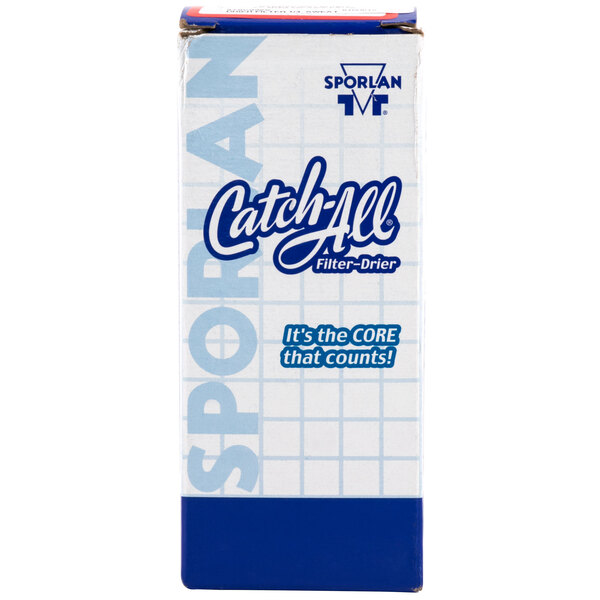 A blue rectangular box with a white sign reading "C-052-S" containing a 1/4" Replacement Refrigerant Filter Drier ODF.