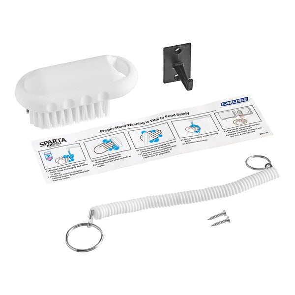 A Carlisle white plastic hand and nail brush with bristles.