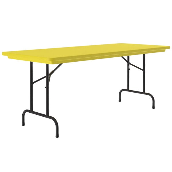 a yellow rectangular table with black legs