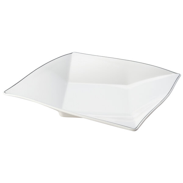 A white square plate with black trim.