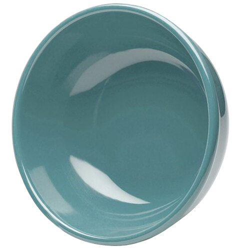 A close-up of a blue Elite Global Solutions melamine bowl with a white and blue surface.