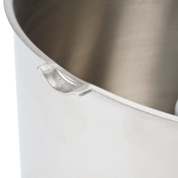 A Robot Coupe stainless steel bowl with a handle and lid.