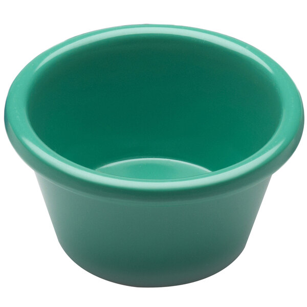 A close-up of a green Elite Global Solutions melamine ramekin.