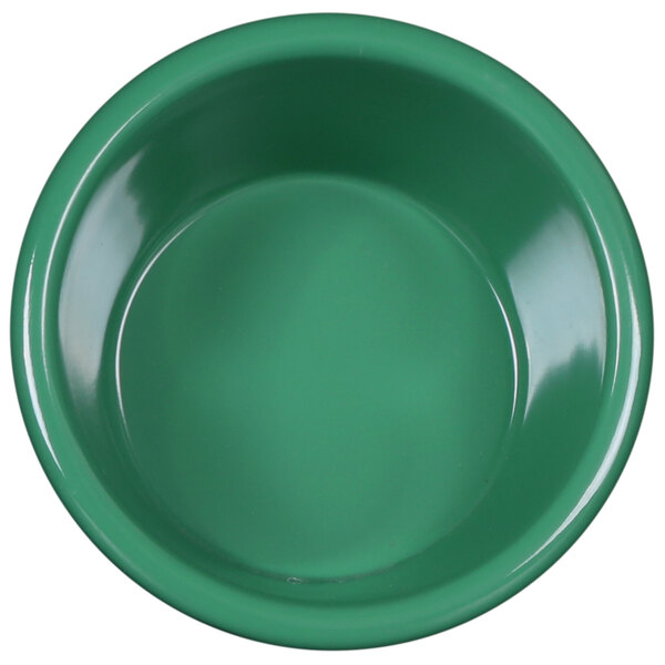An Elite Global Solutions Rio autumn green melamine ramekin with a round center and a white background.