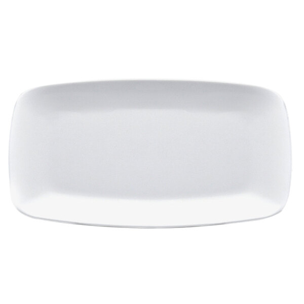 A white rectangular melamine platter with a small rim.