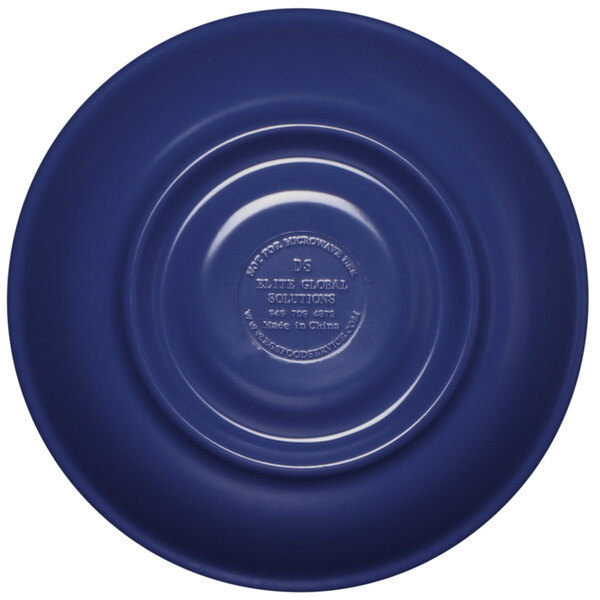 A blue Elite Global Solutions Rio melamine coffee saucer with a circular pattern and white rim.