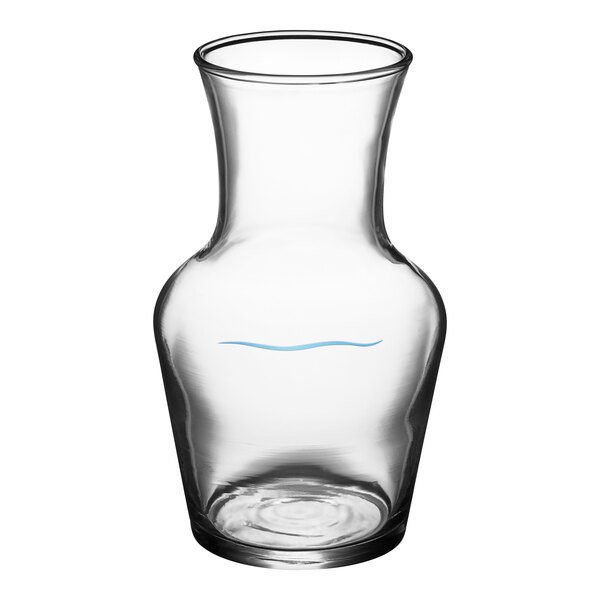 An Arcoroc clear glass carafe with a blue pour line.