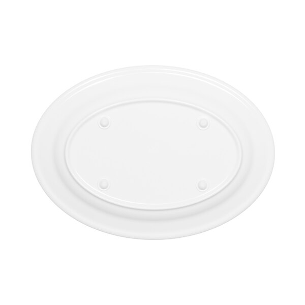 A white oval melamine platter with dots.