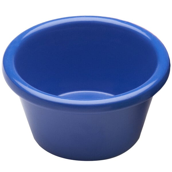 An Elite Global Solutions purple melamine ramekin with a white interior.