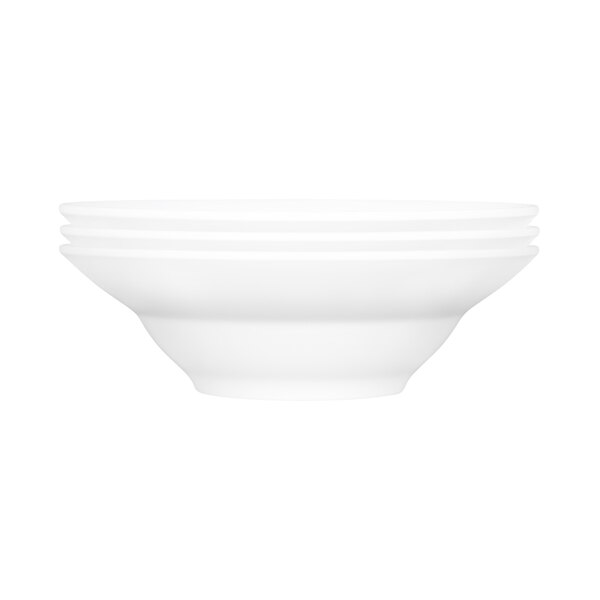 A stack of white Elite Global Solutions Patriarch melamine bowls.
