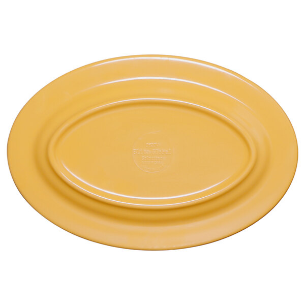 A yellow oval Elite Global Solutions melamine platter.