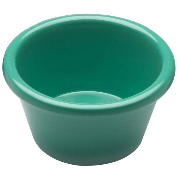 A close-up of a green Elite Global Solutions melamine ramekin.