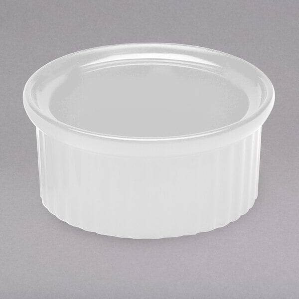 A white fluted Elite Global Solutions melamine ramekin.