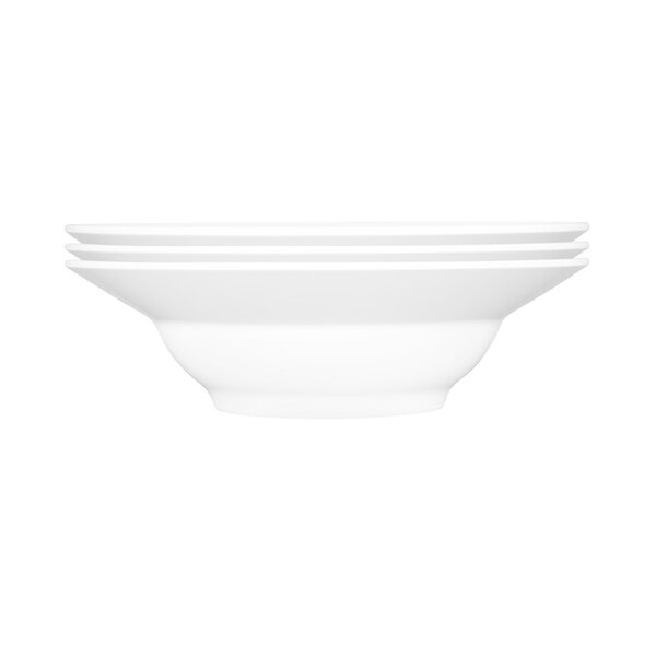 A stack of white Elite Global Solutions Patriarch melamine bowls.