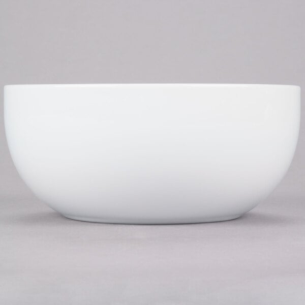 A close-up of a 10 Strawberry Street Royal Coupe white porcelain soup bowl.