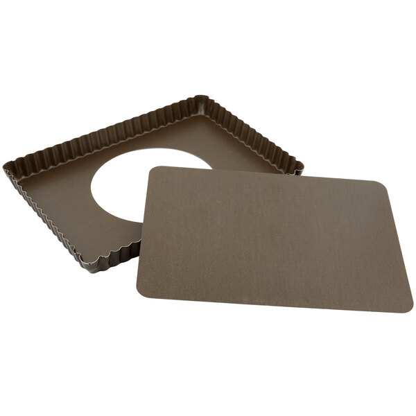 A brown rectangular Gobel non-stick tart/quiche pan with a removable bottom.