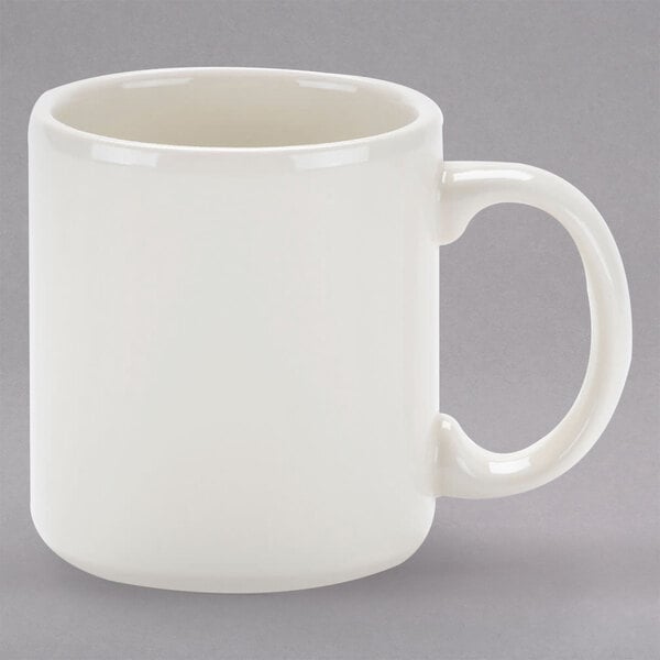 A white Homer Laughlin mug with a handle.