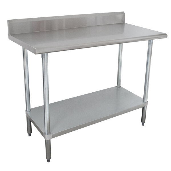 A stainless steel Advance Tabco work table with undershelf.