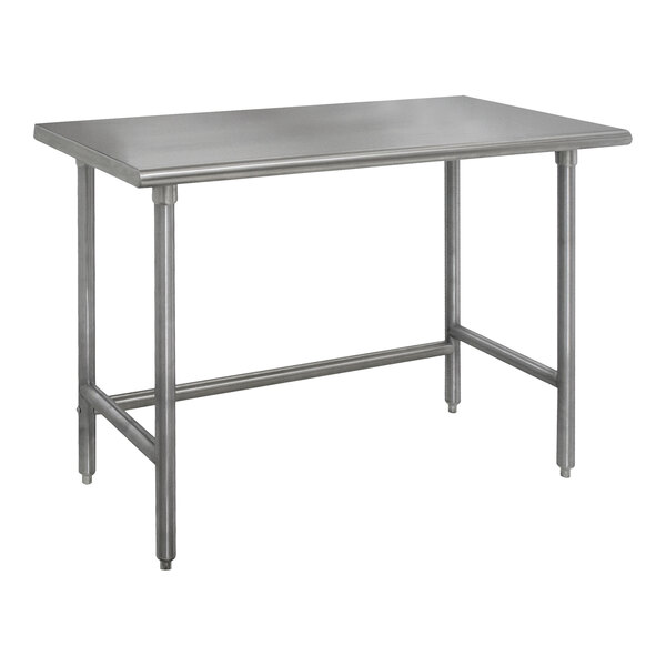 An Advance Tabco stainless steel work table with an open base.