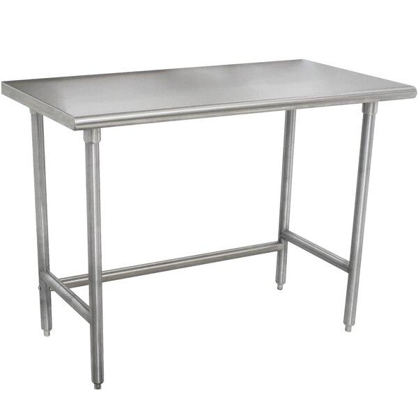 A silver metal Advance Tabco work table with an open base and stainless steel top and legs.
