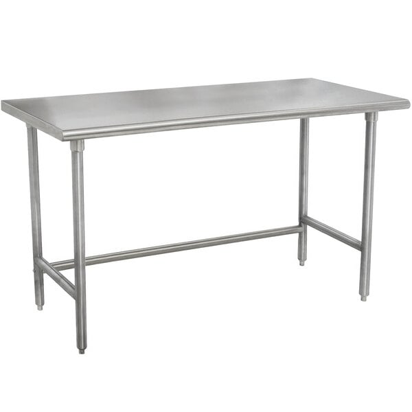 A silver rectangular Advance Tabco work table with stainless steel legs.