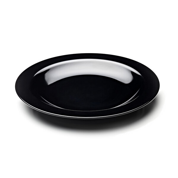 A black plate with a wide rim on a white background.