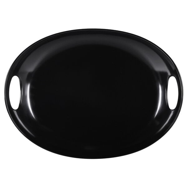 A black oval melamine tray with two handles.