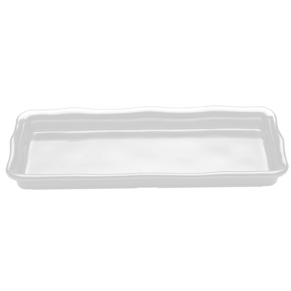 A white rectangular melamine tray with wavy edges.