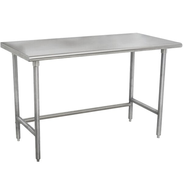 A rectangular stainless steel Advance Tabco work table with an open base.
