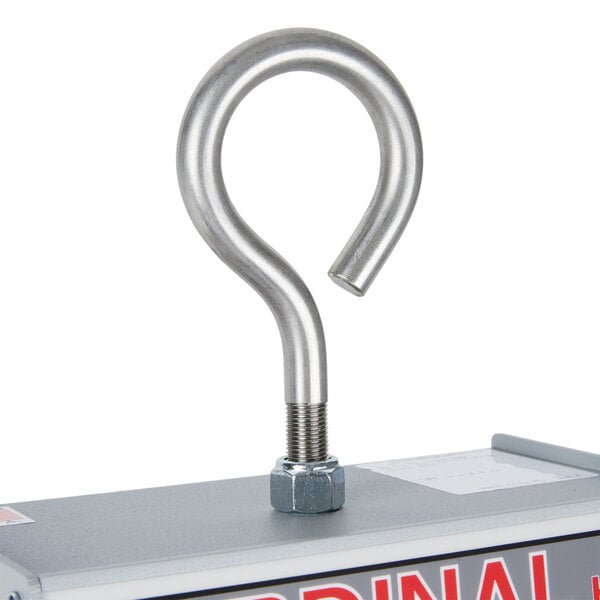 A silver metal hook with a nut on top.