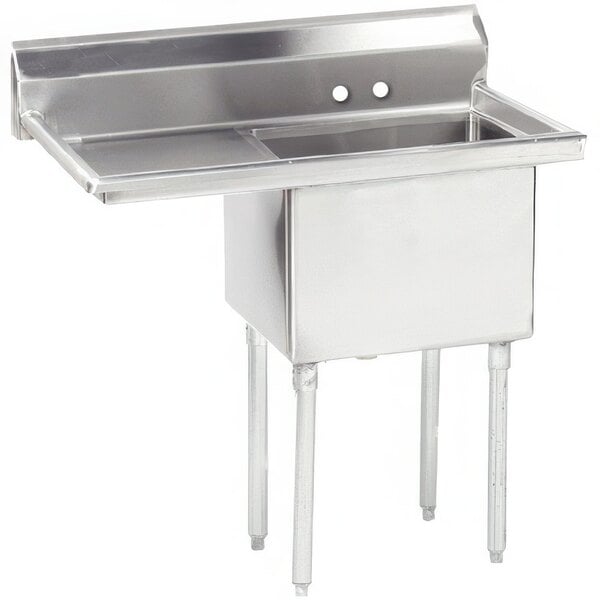 A stainless steel Advance Tabco commercial sink with two compartments and a left drainboard.