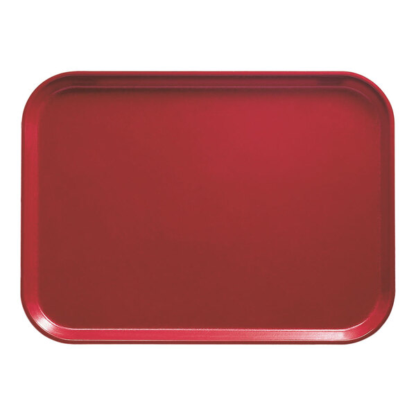 A red rectangular Cambro fiberglass tray on a counter.