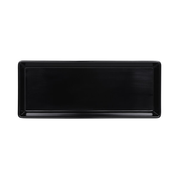 A black rectangular melamine bowl with a white border.